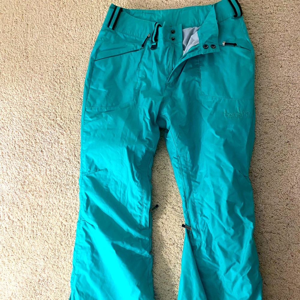 Rainer ski pants. More green/teal than blue.